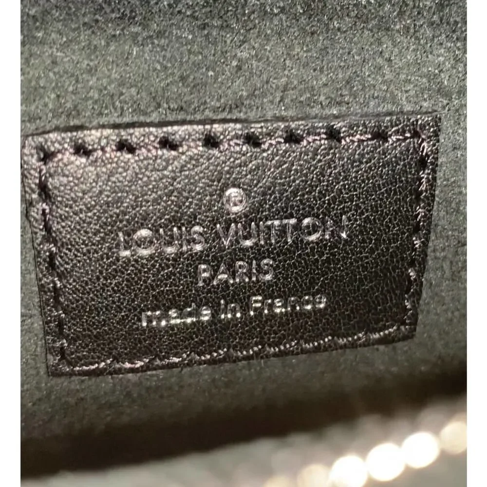 LOUIS VUITTON Reverse Monogram Kabuki Japan Eyes Pochette shoulder bag Pink LV